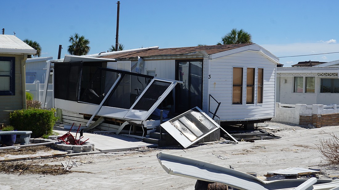A partially destroyed home in the Twin Shores community on Longboat Key after Hurricane Milton.