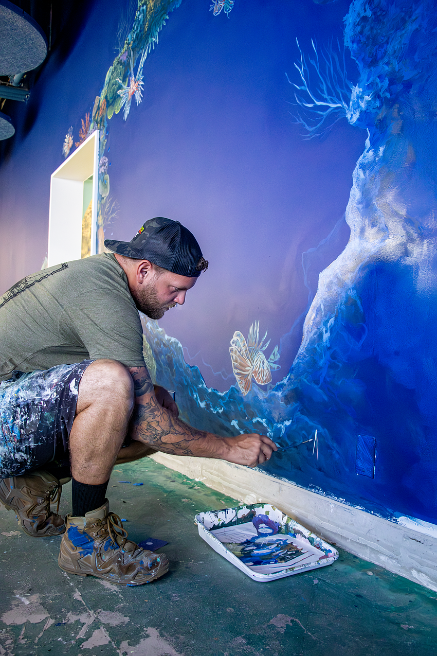 Bradenton artist Andrew Viera says he doesn't want his murals to